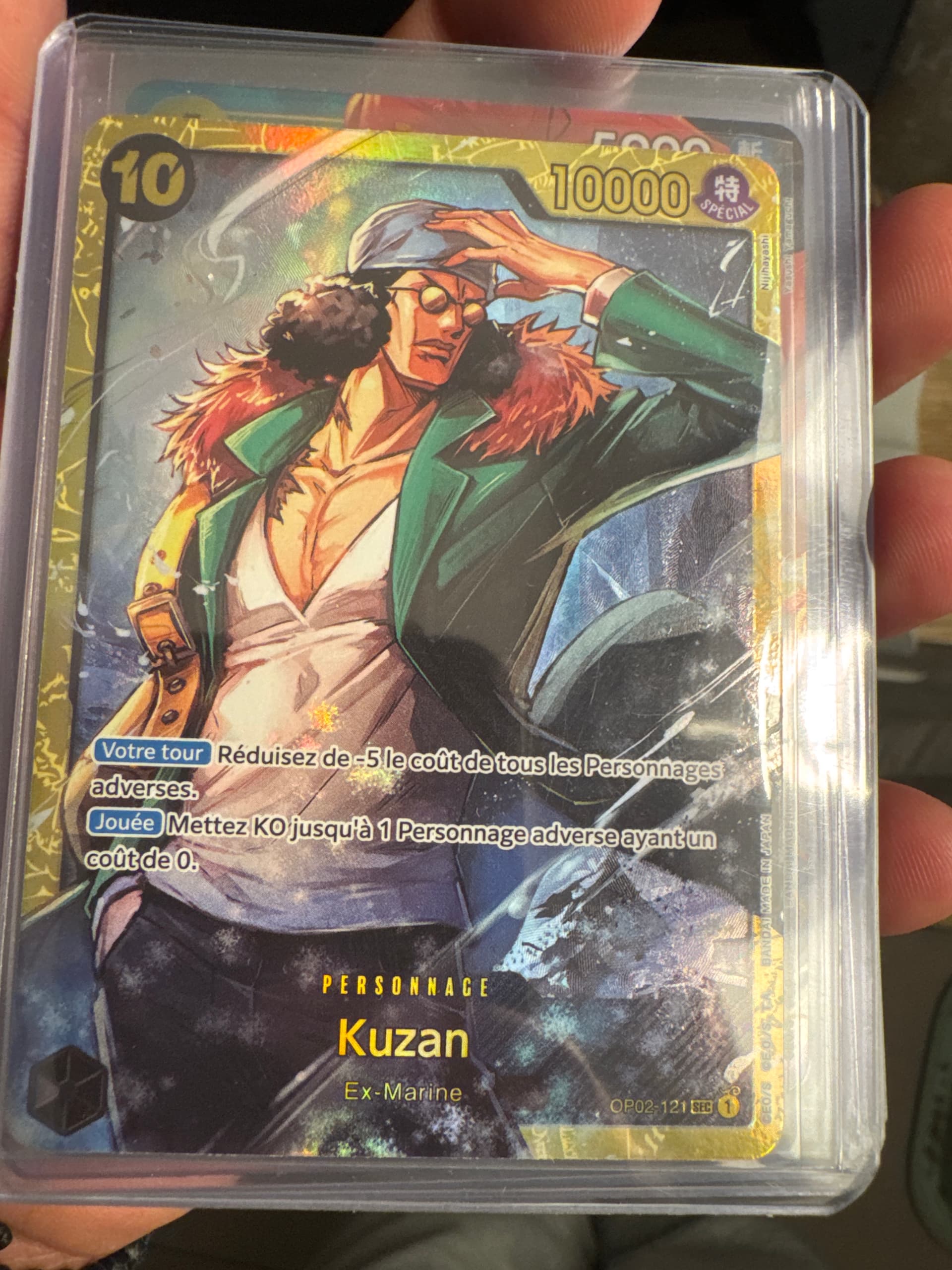 Carte Kuzan OP02-121_p1 Secret Rare du set OP-02 Paramount War (langue FR) — One Piece TCG édité par Bandai