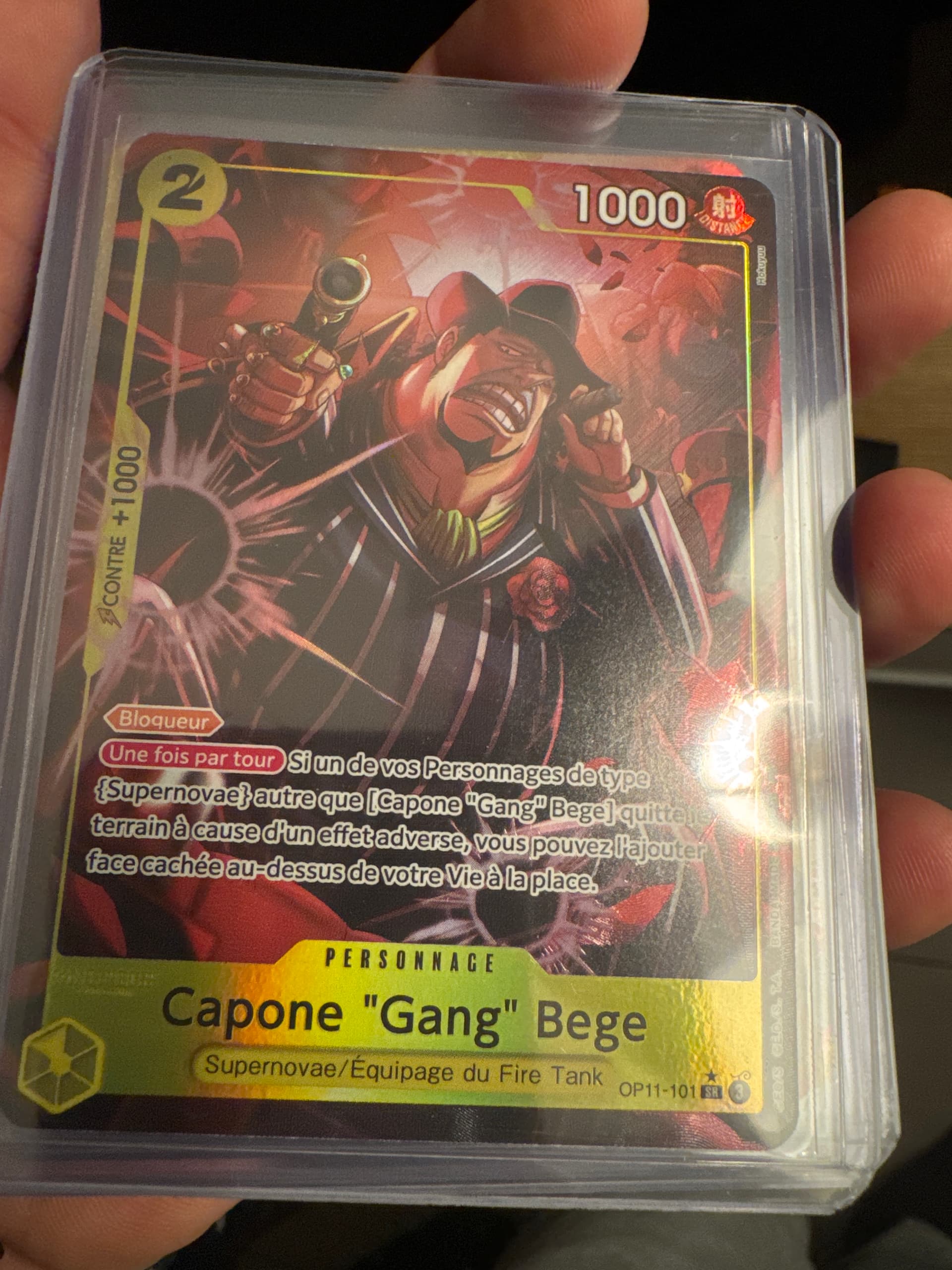 Carte Capone "Gang" Bege OP11-101_p1 Super Rare du set OP-11 A Fist of Divine Speed (langue FR) — One Piece TCG édité par Bandai