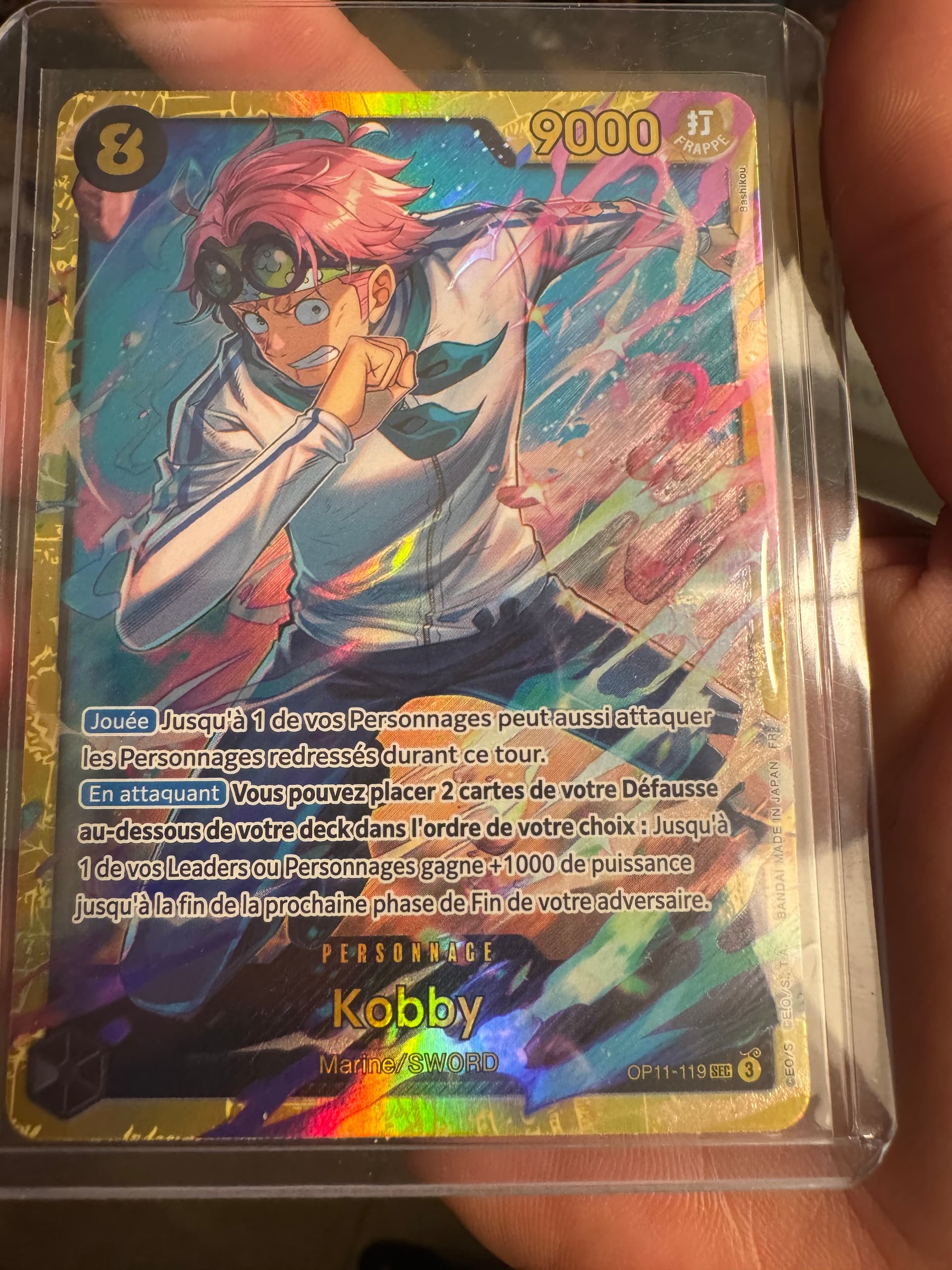 Carte Kobby OP11-119SEC Secret Rare du set OP11 Awakening of the New Era (langue FR) — One Piece TCG édité par Bandai